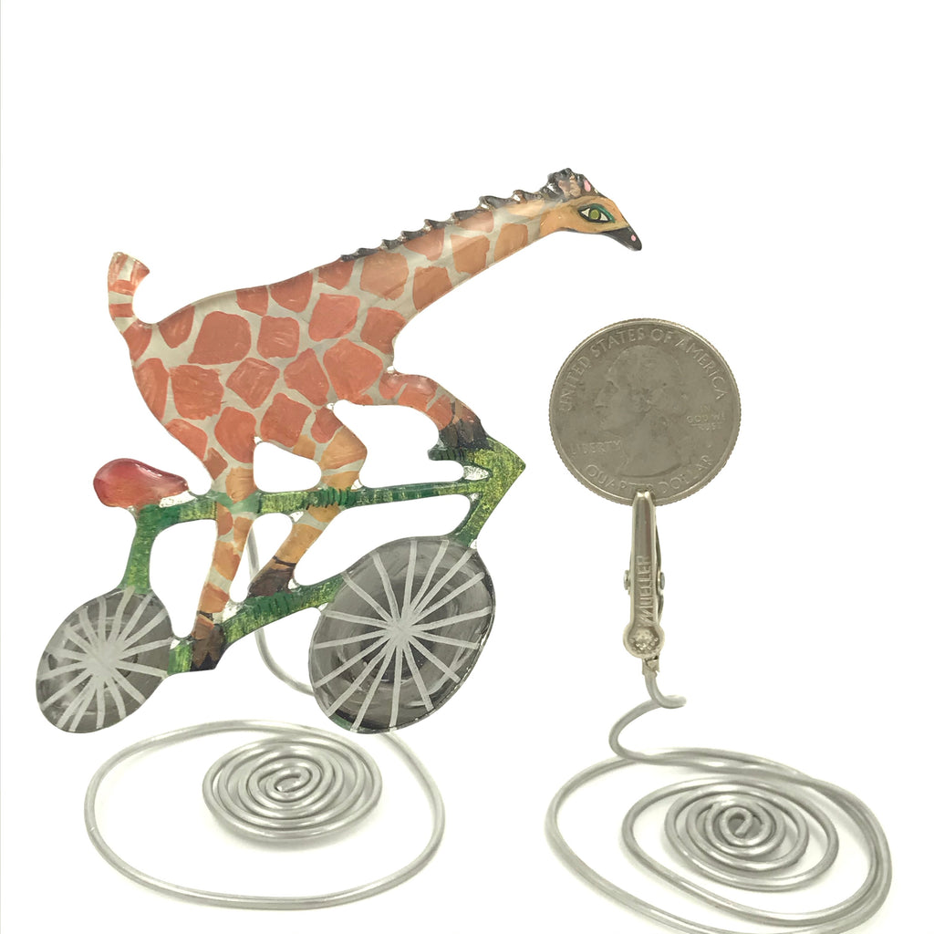 giraffe on a bicycle