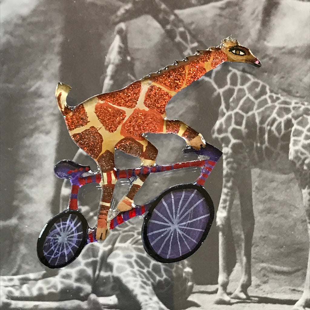 giraffe on a bicycle